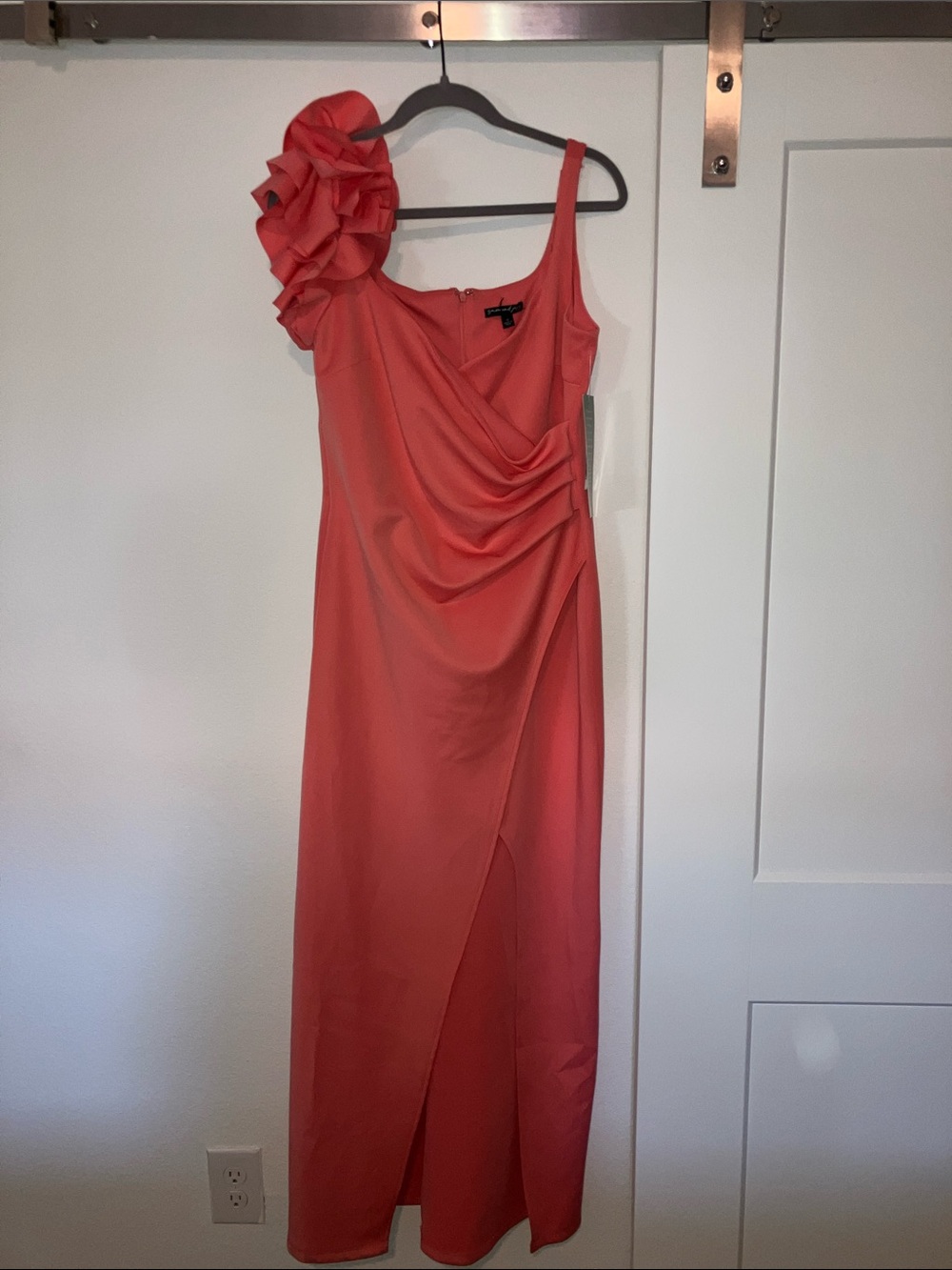 One-Shoulder Coral Evening Gown with Floral Shoulder Accent